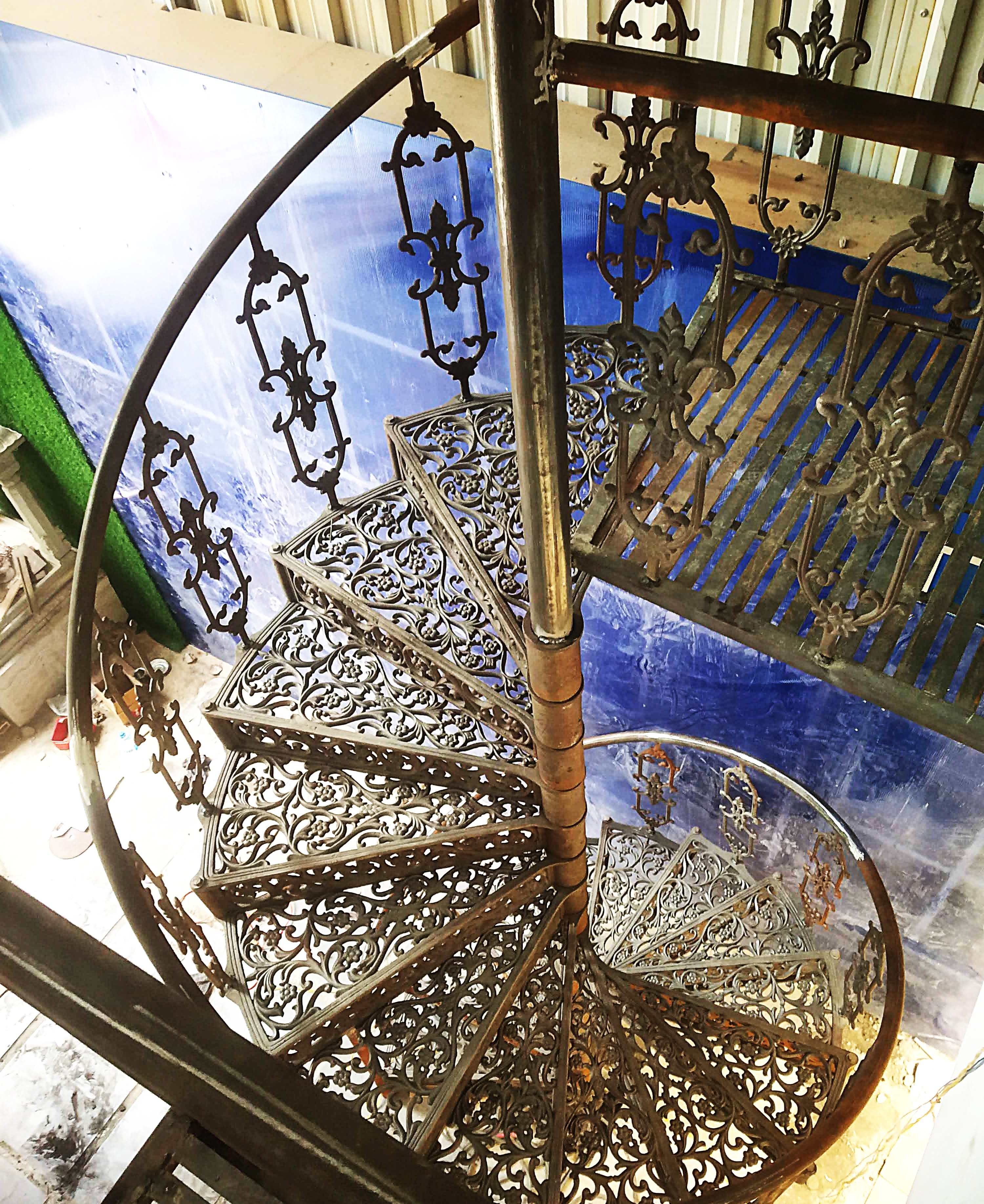 Victorian spiral steel staircase fabricated in Salem, Tamil Nadu